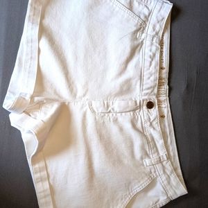 J Lo white trouser shorts